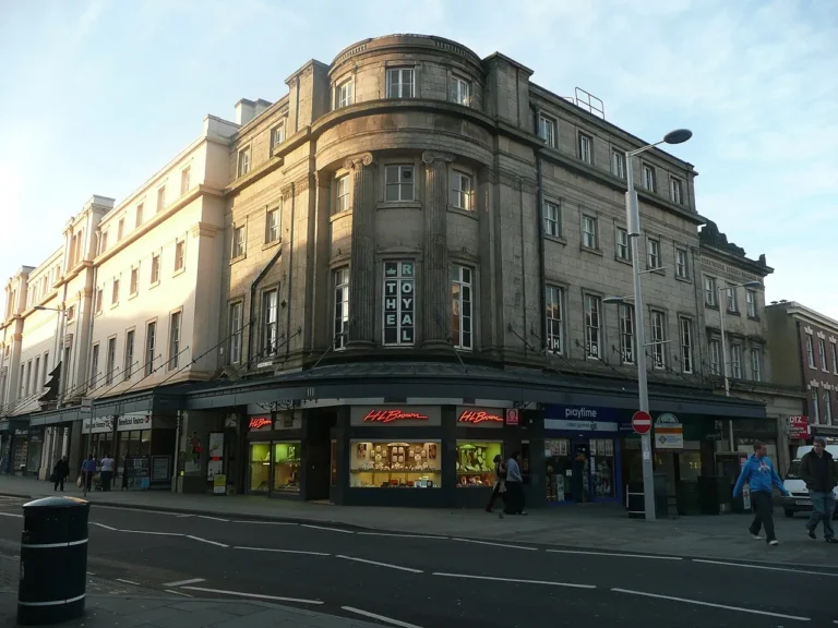 The former Royal Hotel at the corner of Victoria Street and Corn Market in 2008, with The Royal lettering in the curved corner window