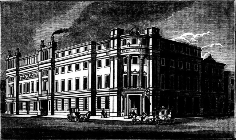 1839 wood engraving of the newly built Royal Hotel, Derby, with Royal Hotel lettered on the curved corner, the royal coat of arms above, and horse-drawn coaches in the street outside